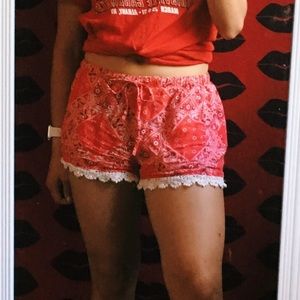 Red floral shorts